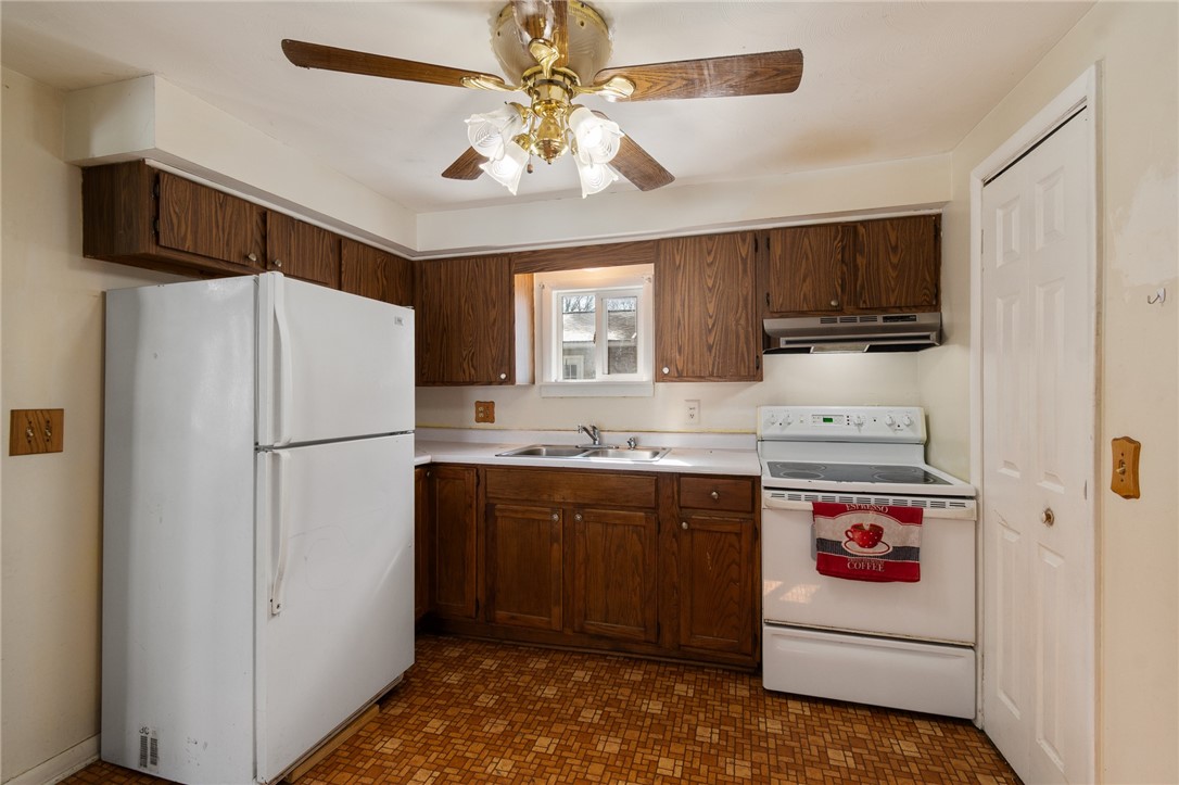 4024 Ridgeway Street Williamson, NY 14589 - Photo 10 of 28 The kitchen - large WALK IN pantry too!