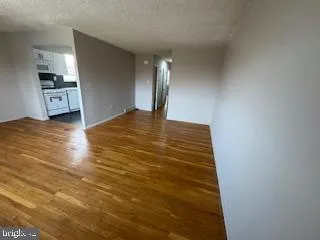 a view of a kitchen with a sink