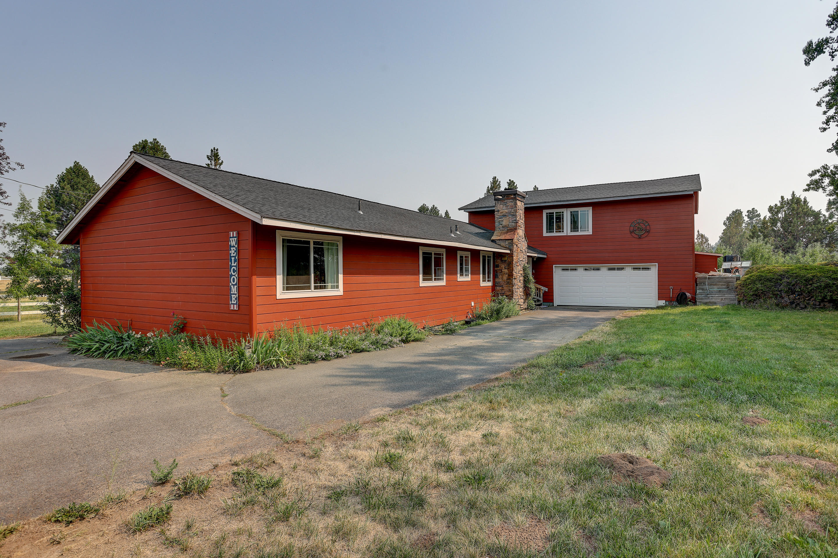 60875 Billadeau Road Bend, OR 97702 - Photo 33 of 42 front view of a house with a yard
