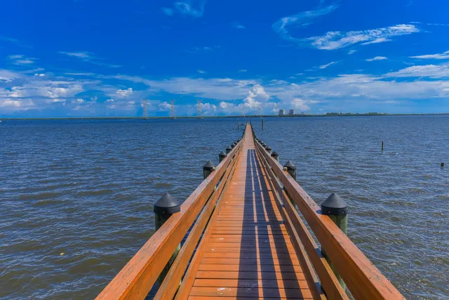 a view of a livingroom with furniture and a chandelier