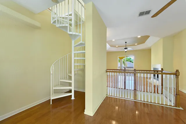 a view of a backyard with sitting area