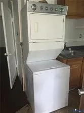 an empty room with wooden floor