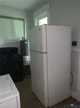 a utility room with washer and dryer