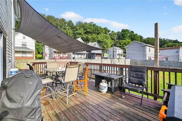 a view of balcony with furniture