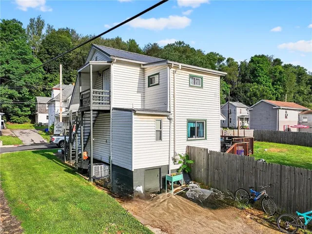 an aerial view of city and lake view