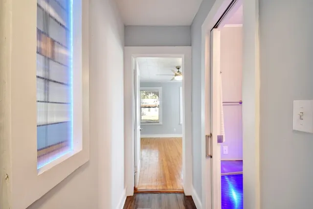 a view of a bedroom from a hallway