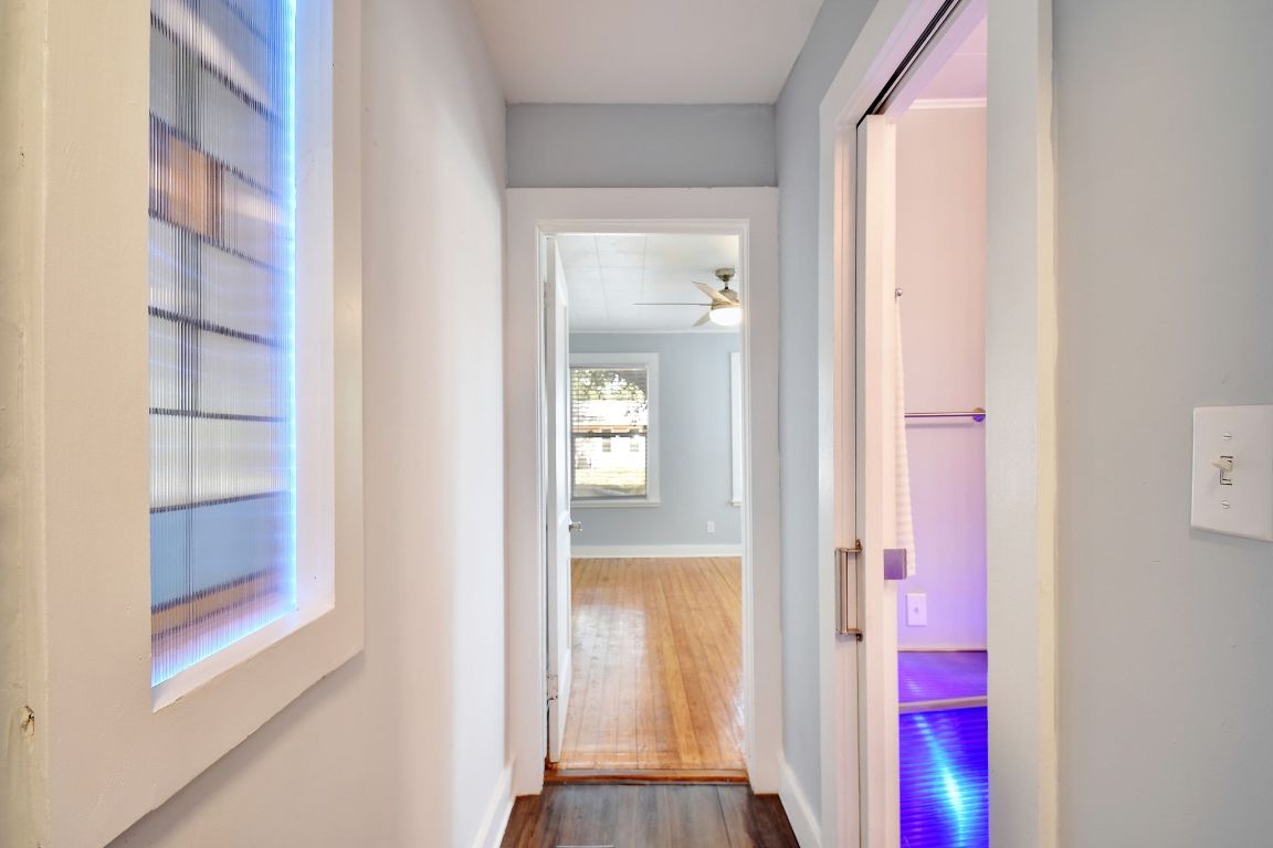717 South Laurel Avenue Luling, TX 78648 - Photo 14 of 34 a view of a bedroom from a hallway
