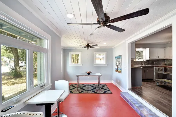 a living room with furniture and a window