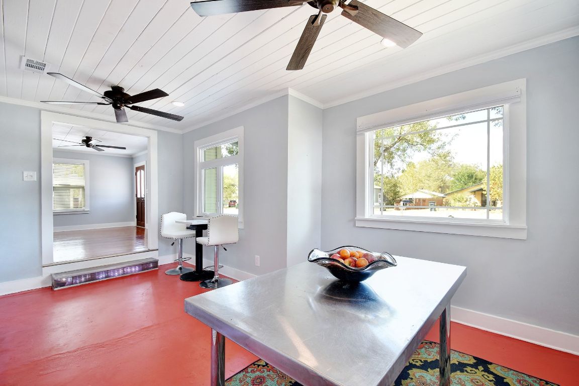 717 South Laurel Avenue Luling, TX 78648 - Photo 6 of 34 a view of a workspace with furniture and a window