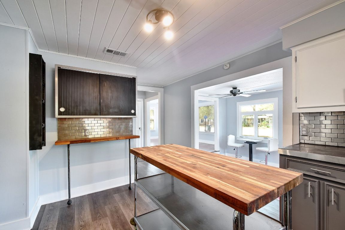 717 South Laurel Avenue Luling, TX 78648 - Photo 9 of 34 a room with pool table and windows