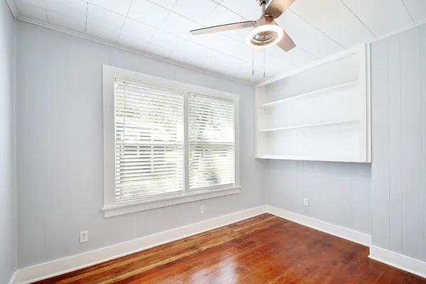 a view of a room with windows