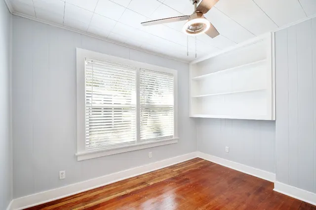 a view of a room with windows