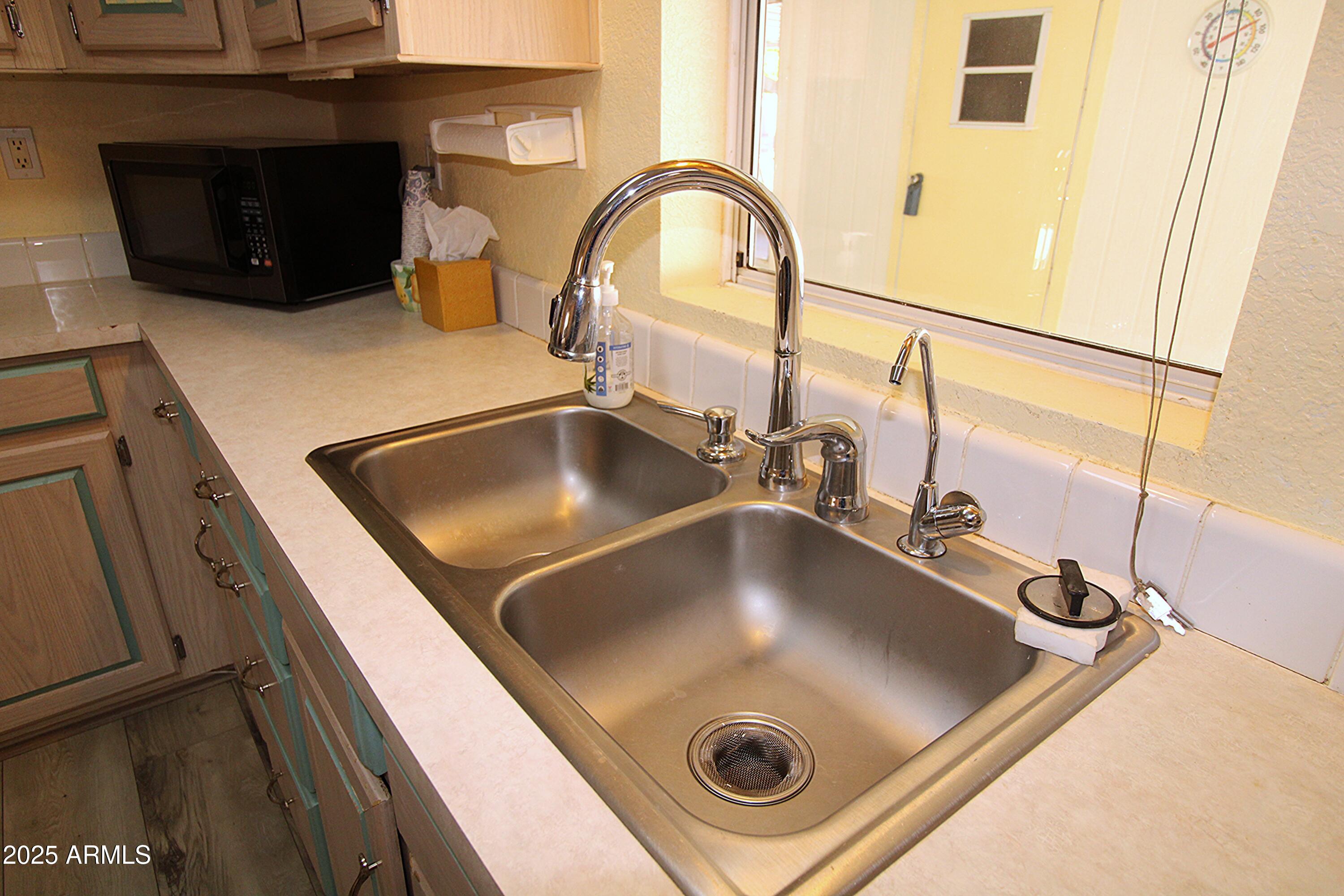 2400 East Baseline Avenue, Unit 232 Apache Junction, AZ 85119 - Photo 11 of 37 a close view of sink and tap