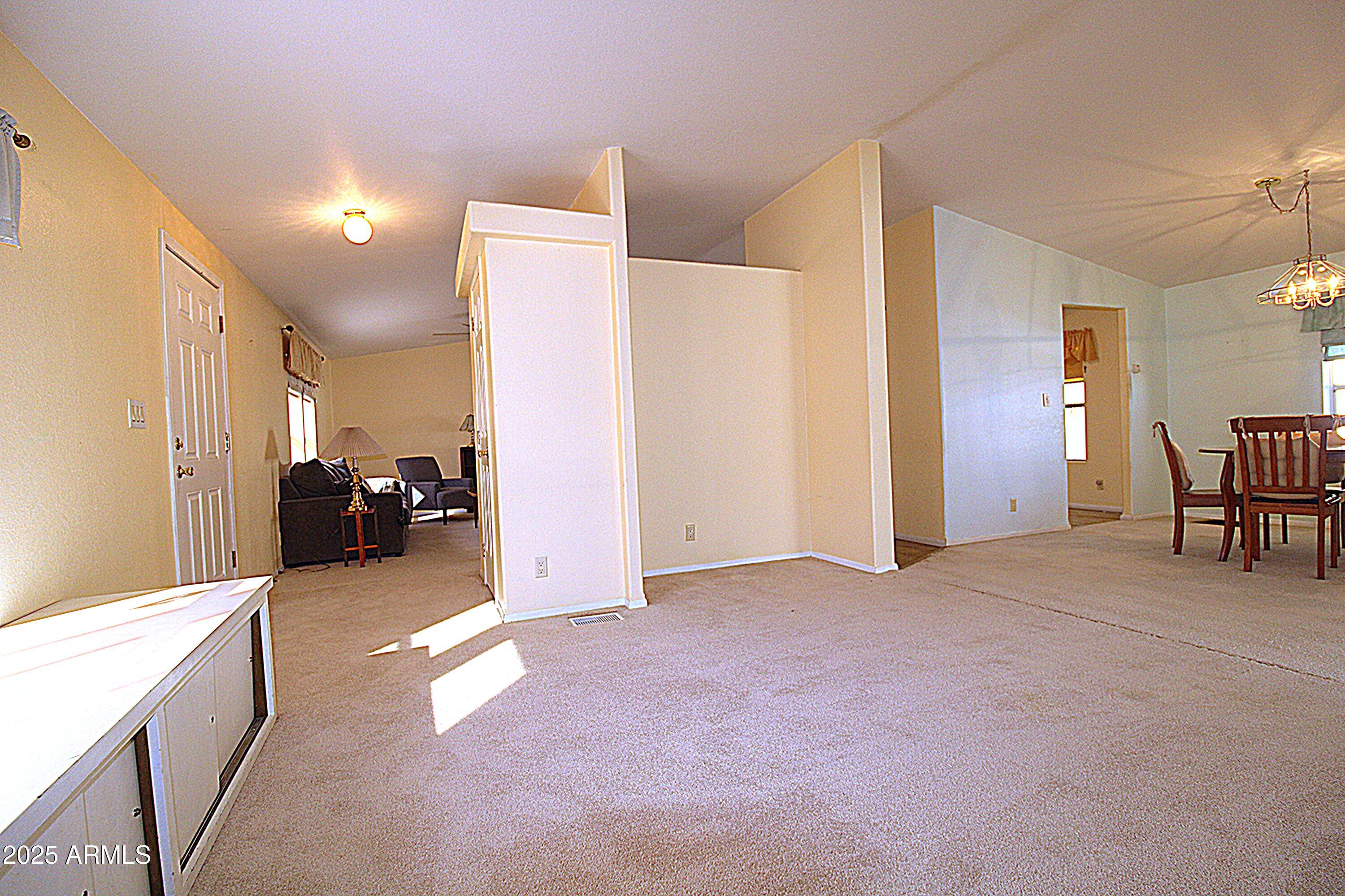2400 East Baseline Avenue, Unit 232 Apache Junction, AZ 85119 - Photo 16 of 37 a view of a livingroom with furniture and a livingroom