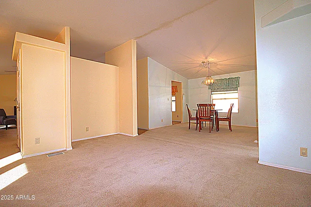 a view of livingroom with furniture and window