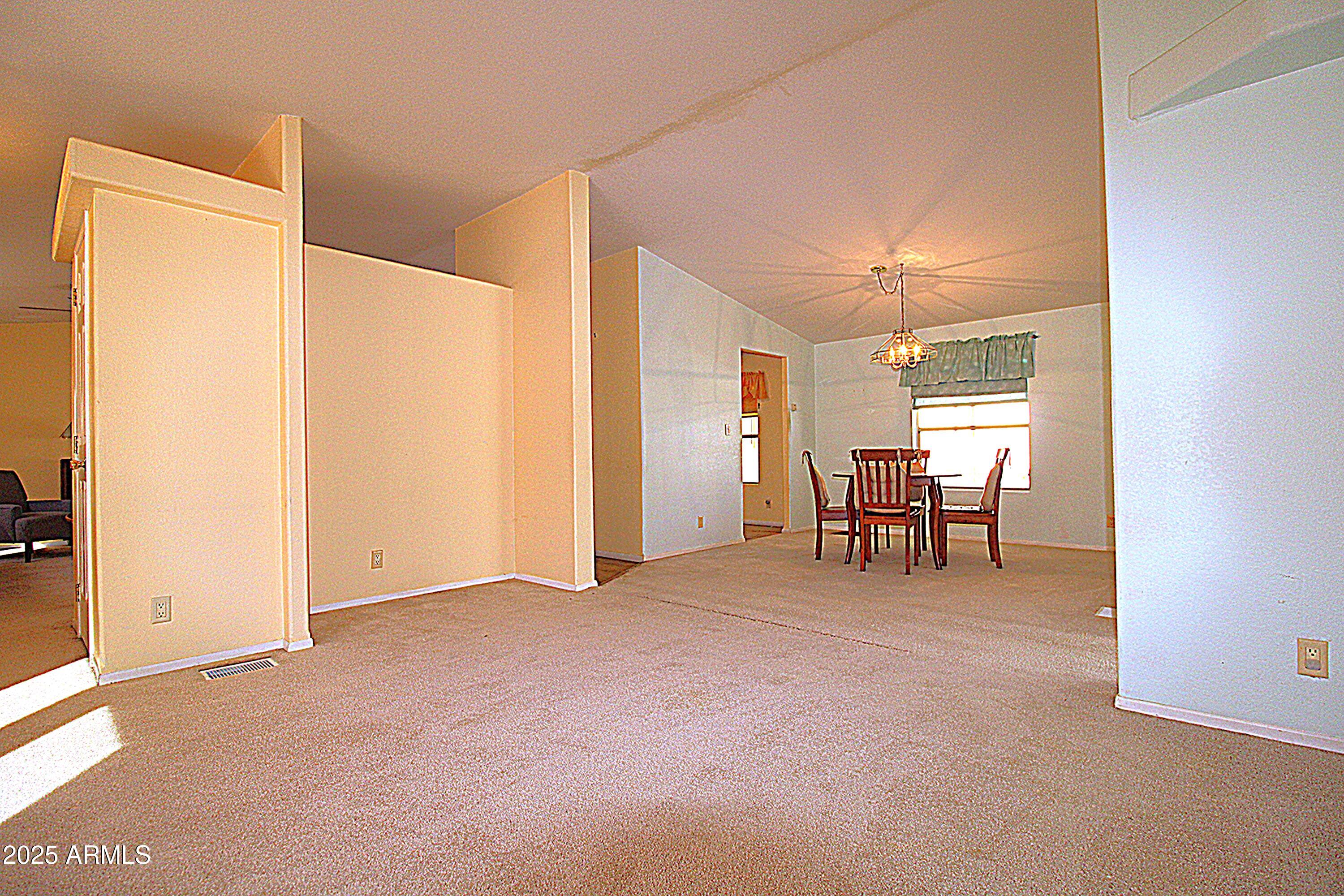 2400 East Baseline Avenue, Unit 232 Apache Junction, AZ 85119 - Photo 17 of 37 a view of livingroom with furniture and window