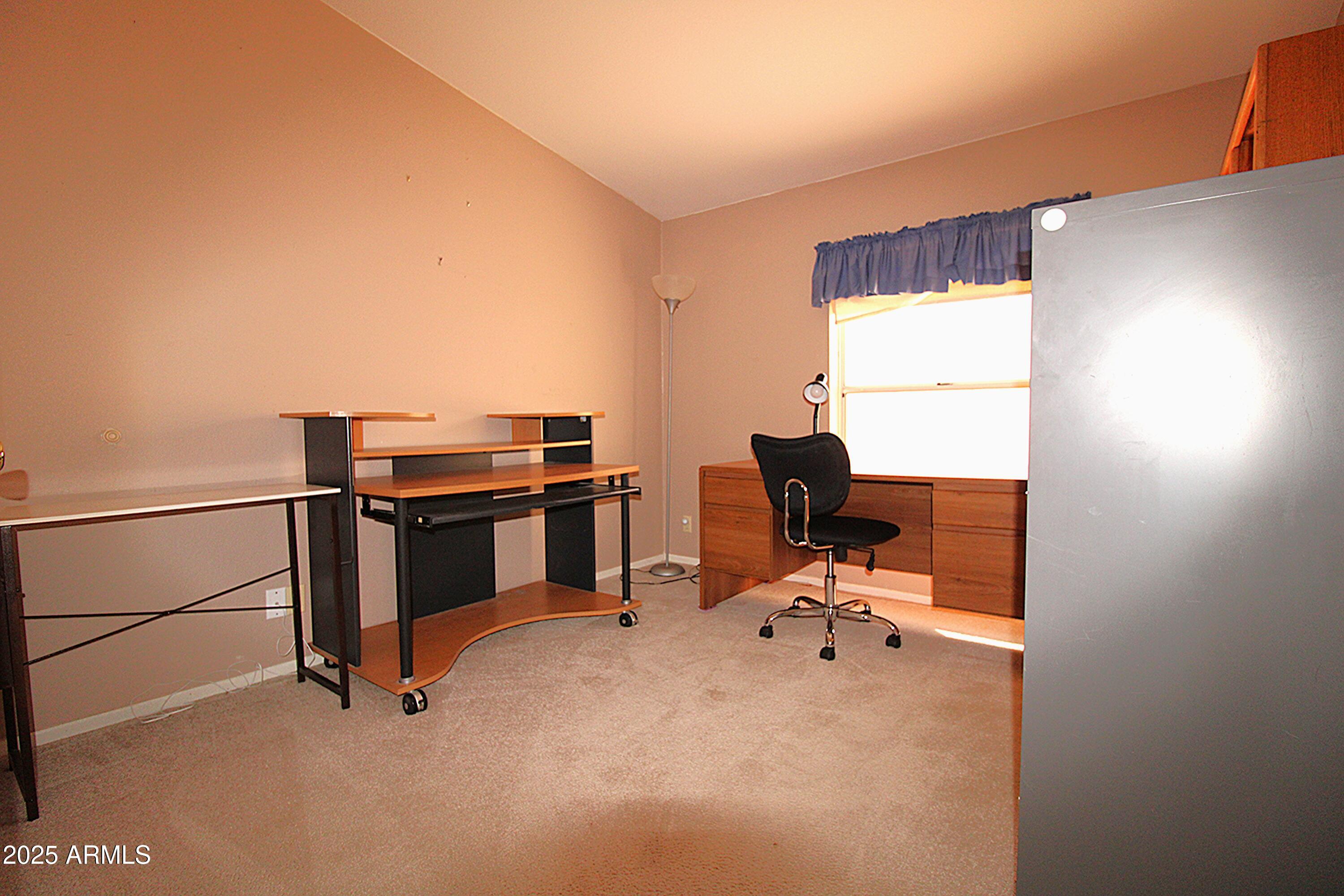 2400 East Baseline Avenue, Unit 232 Apache Junction, AZ 85119 - Photo 26 of 37 a view of a workspace with furniture