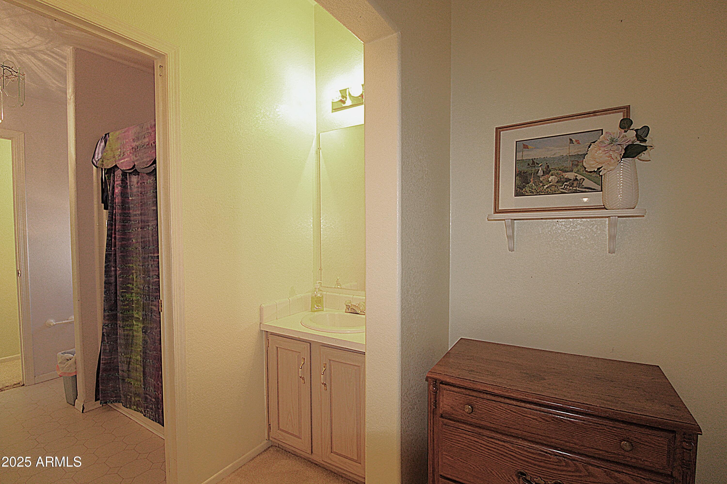 2400 East Baseline Avenue, Unit 232 Apache Junction, AZ 85119 - Photo 32 of 37 a room with storage and utility