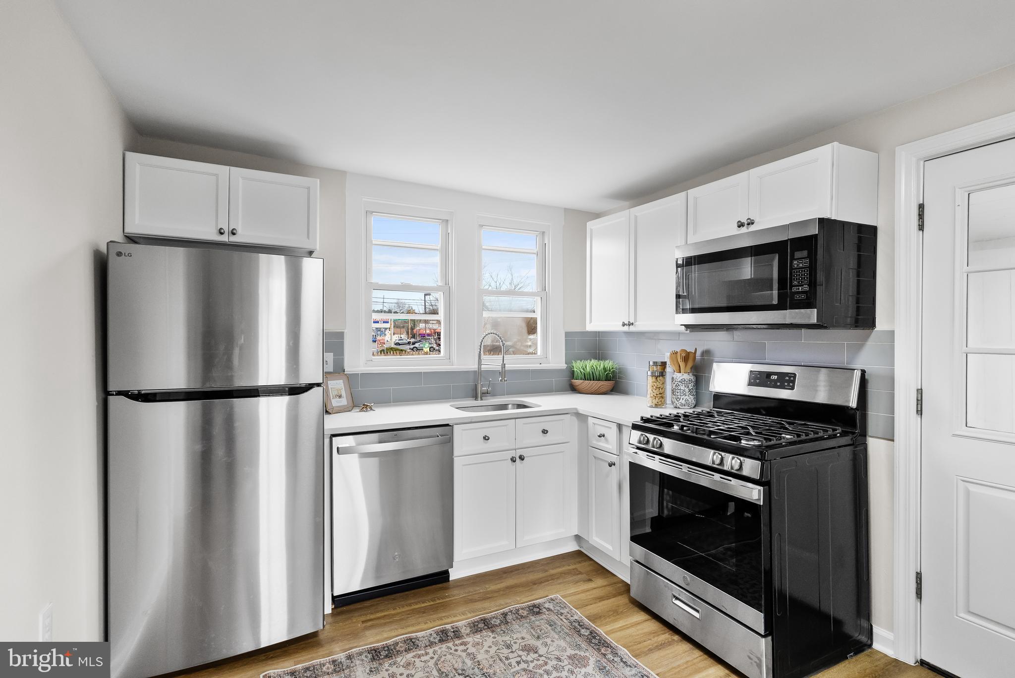 154 Kings Highway Mount Royal, NJ 08061 - Photo 21 of 45 a kitchen with stainless steel appliances a refrigerator stove and microwave