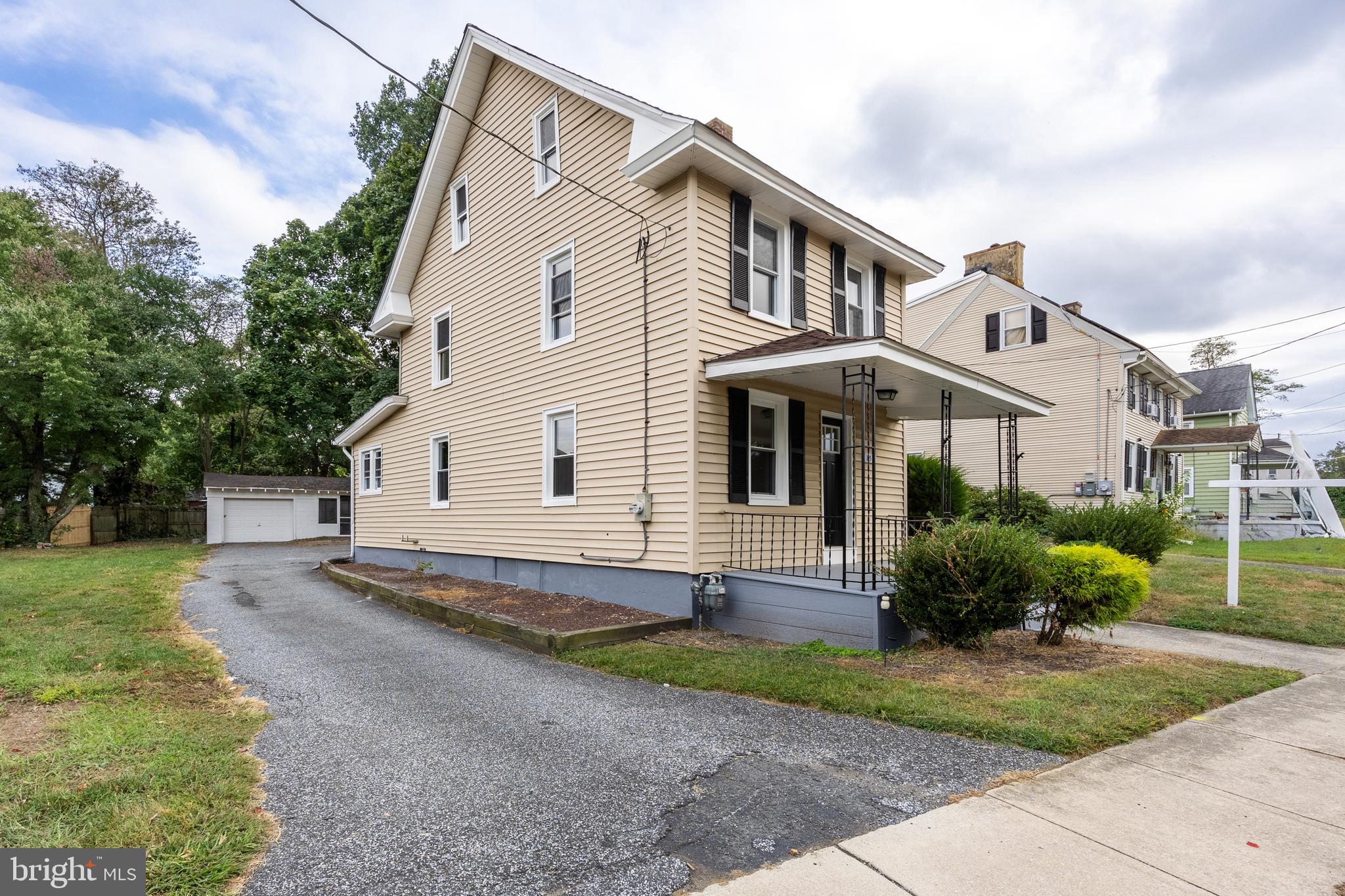 154 Kings Highway Mount Royal, NJ 08061 - Photo 42 of 45 a view of house with a yard and plants