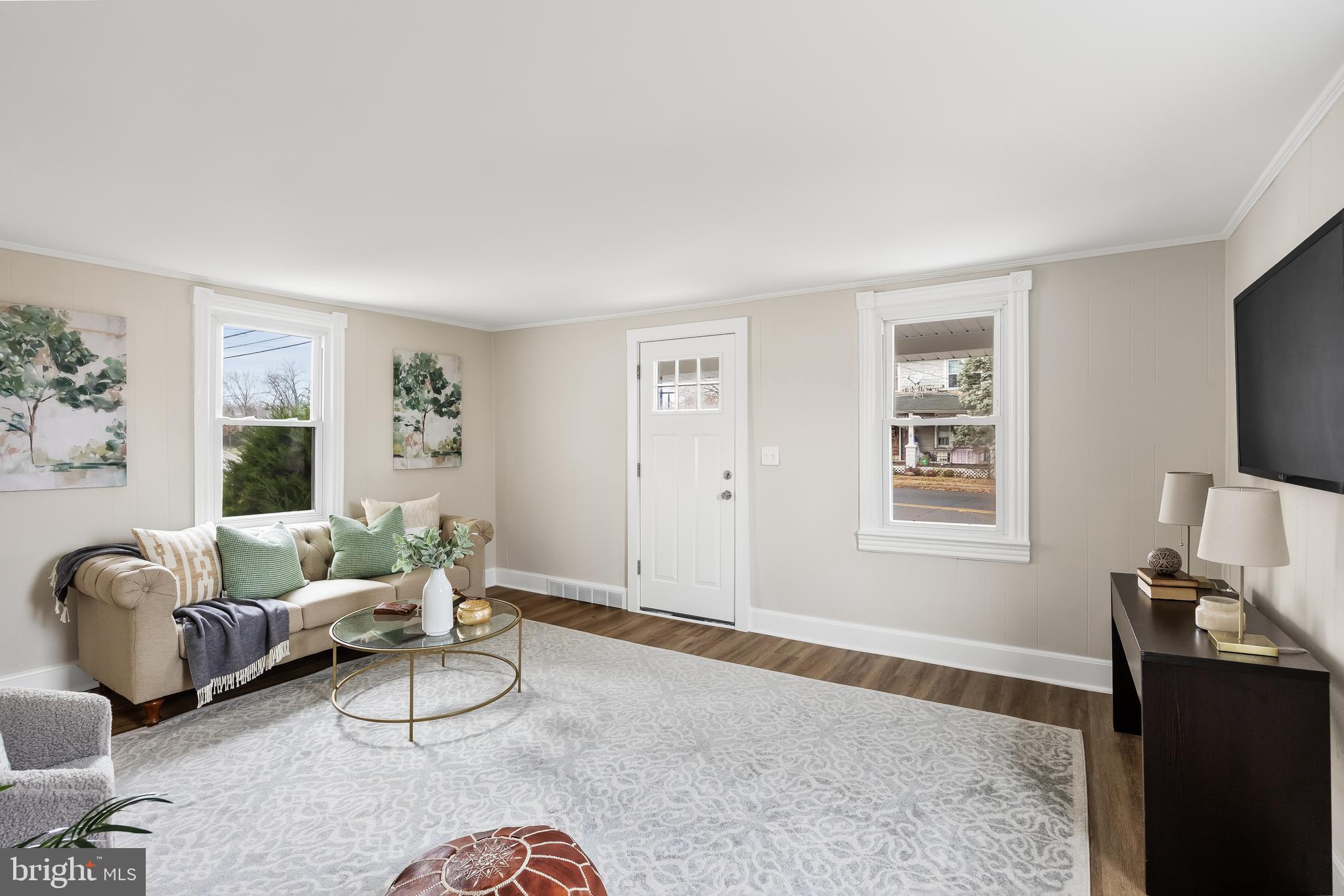 154 Kings Highway Mount Royal, NJ 08061 - Photo 6 of 45 a living room with furniture and a flat screen tv
