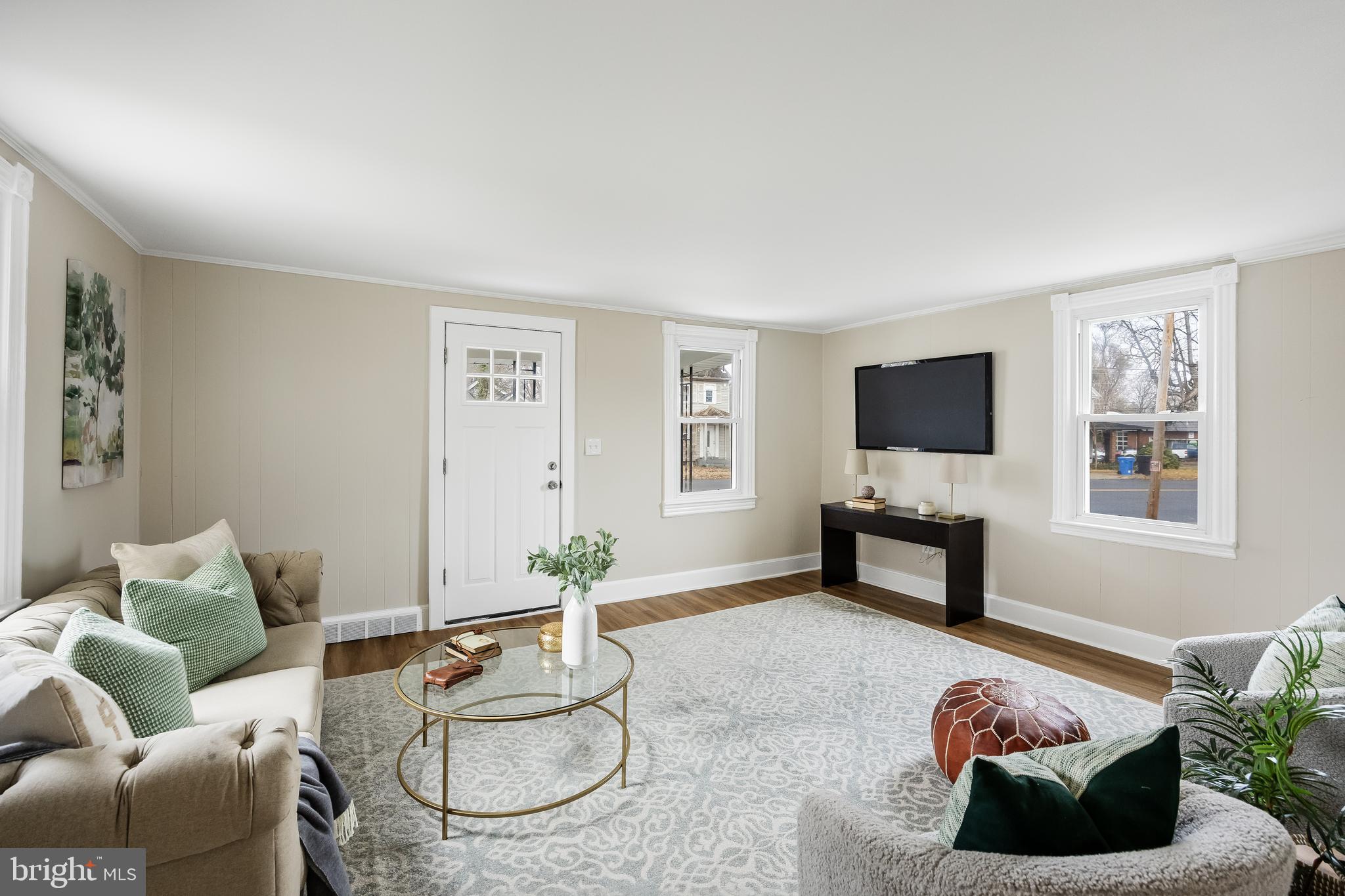 154 Kings Highway Mount Royal, NJ 08061 - Photo 8 of 45 a living room with furniture and a flat screen tv