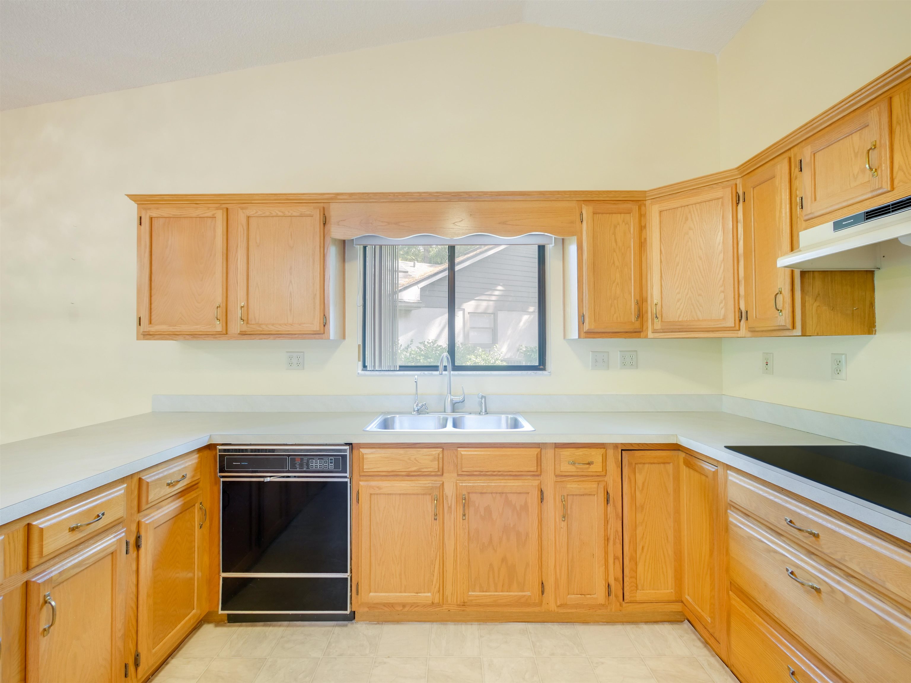 3241 Turtle Creek Road St. Augustine, FL 32086 - Photo 17 of 42 a kitchen with a sink and cabinets