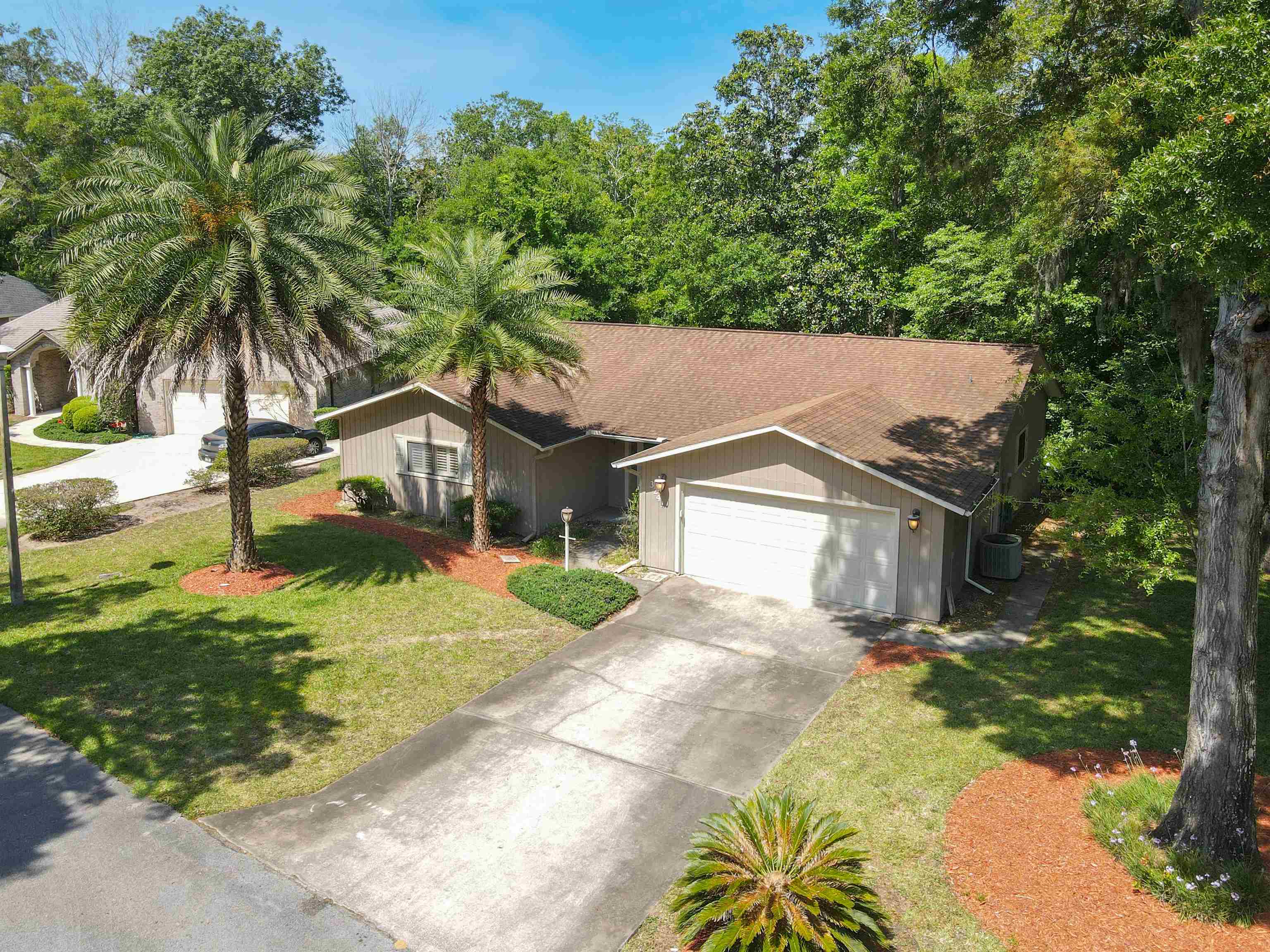 3241 Turtle Creek Road St. Augustine, FL 32086 - Photo 40 of 42 a house with a tree in front of it