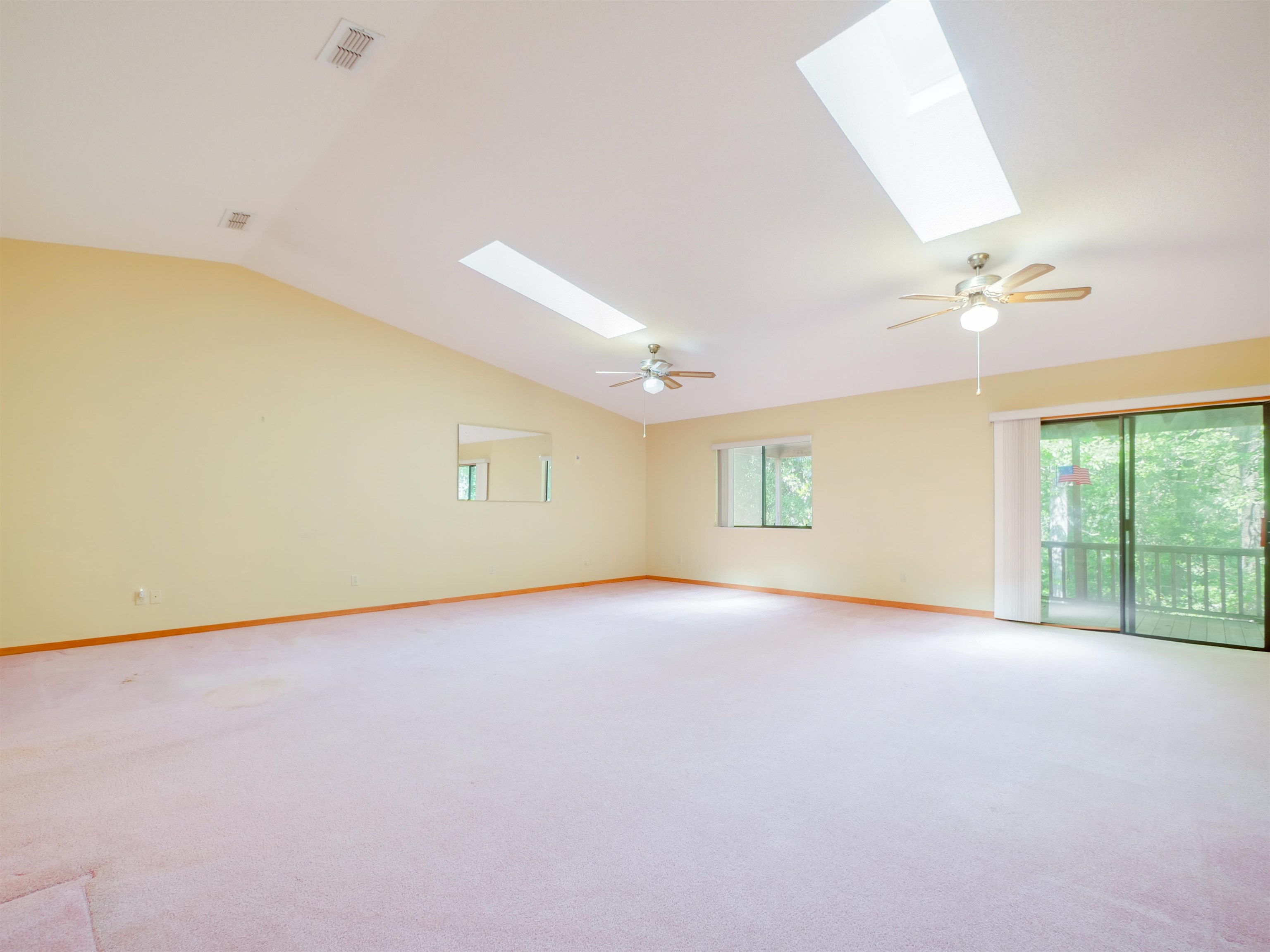 3241 Turtle Creek Road St. Augustine, FL 32086 - Photo 8 of 42 an empty room with a empty space and windows