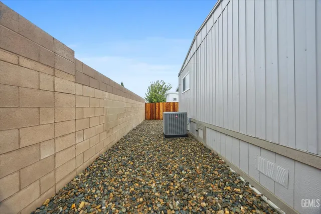 a view of a studio with wooden floor