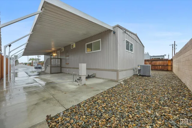 a view of a studio with wooden floor