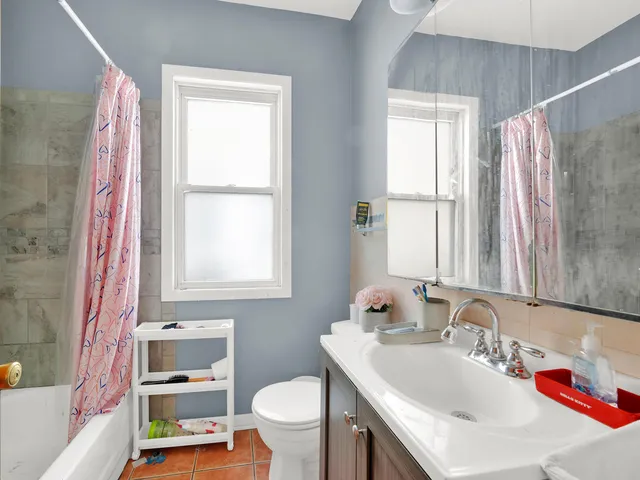 a bathroom with a sink and a toilet