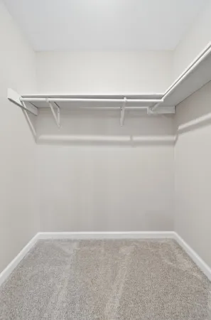 a small white house with a outdoor space