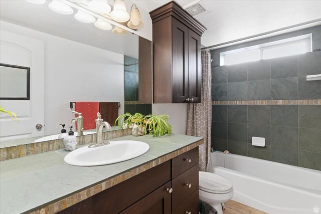 6237 West 4600th Street South Hooper, UT 84315 - Photo 30 of 48 Full bathroom featuring vanity and shower / bath combination with curtain