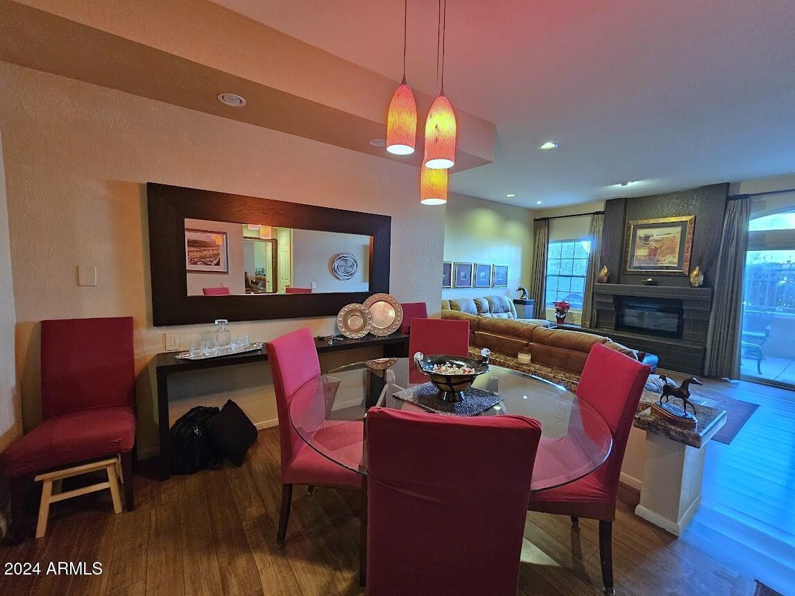 10015 East Mountain View Road, Unit 1002 Scottsdale, AZ 85258 - Photo 6 of 24 a view of a dining room with furniture