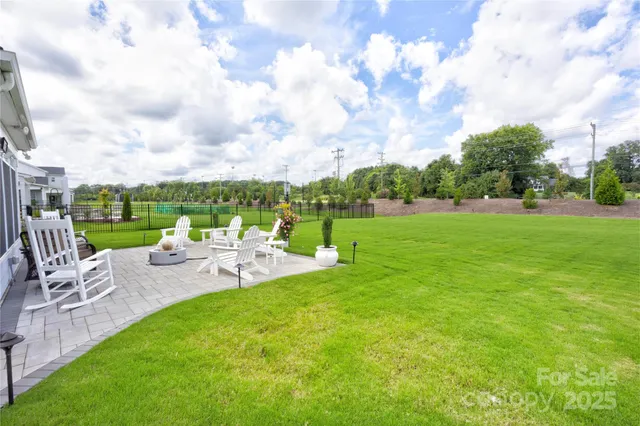 a view of a park with lounge chairs
