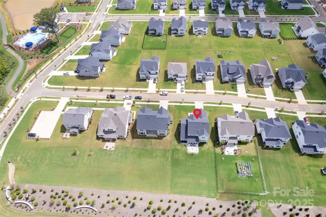 a view of swimming pool with a yard