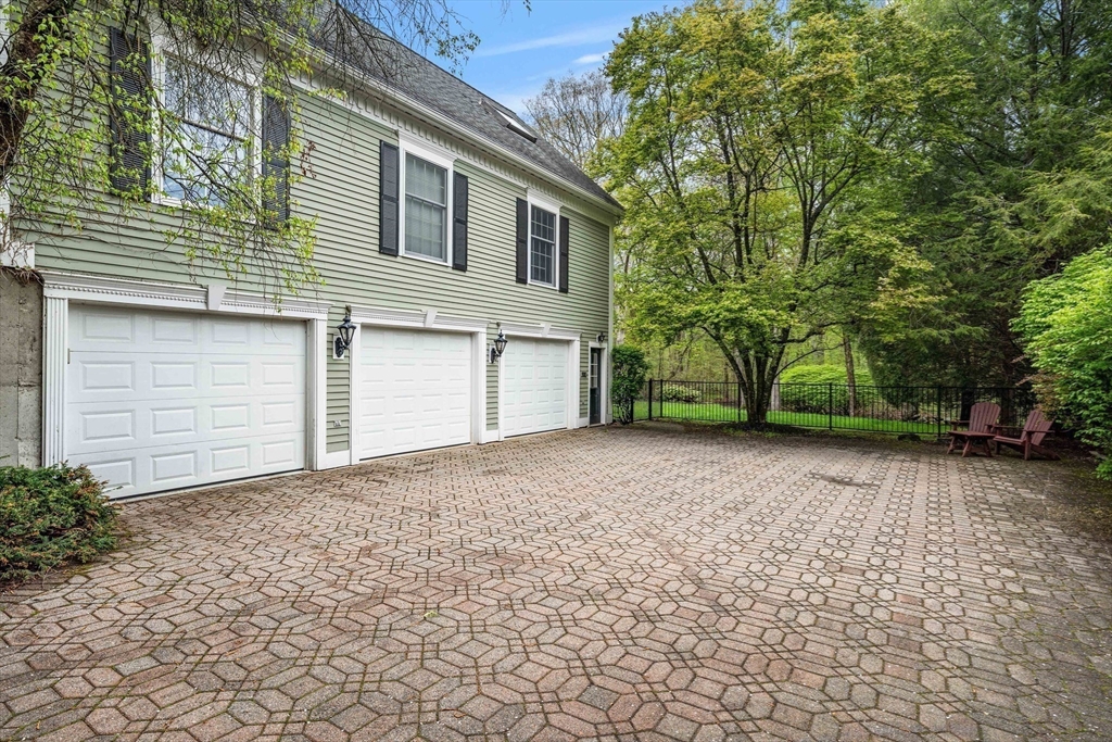 37 Old Planters Road Beverly, MA 01915 - Photo 39 of 42 a view of a house with a yard