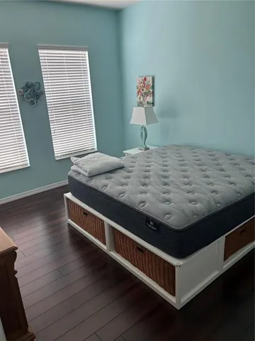 a kitchen with stainless steel appliances granite countertop a refrigerator and a stove