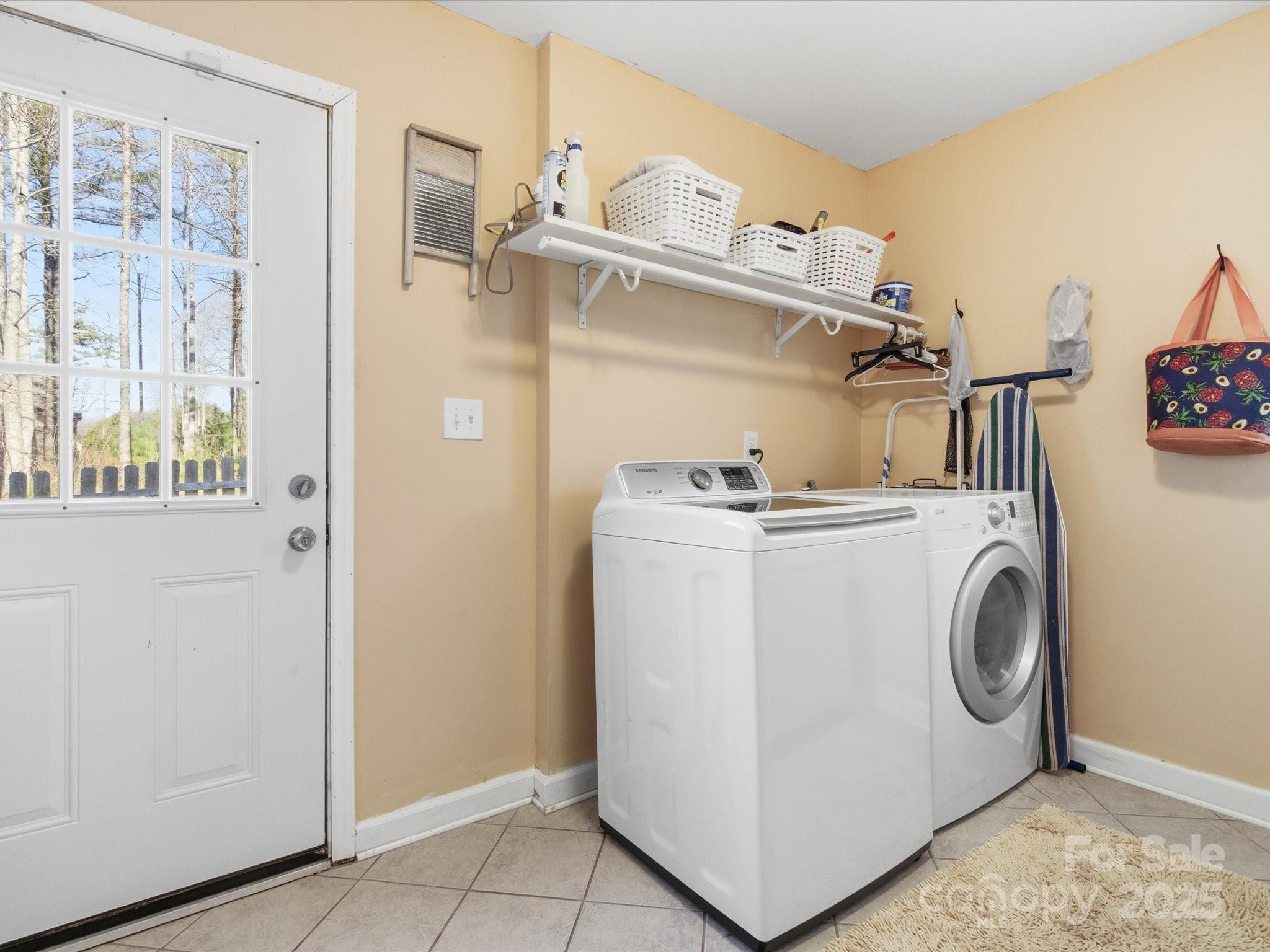 9941 Ferguson Road Charlotte, NC 28227 - Photo 29 of 29 a utility room with dryer and washer