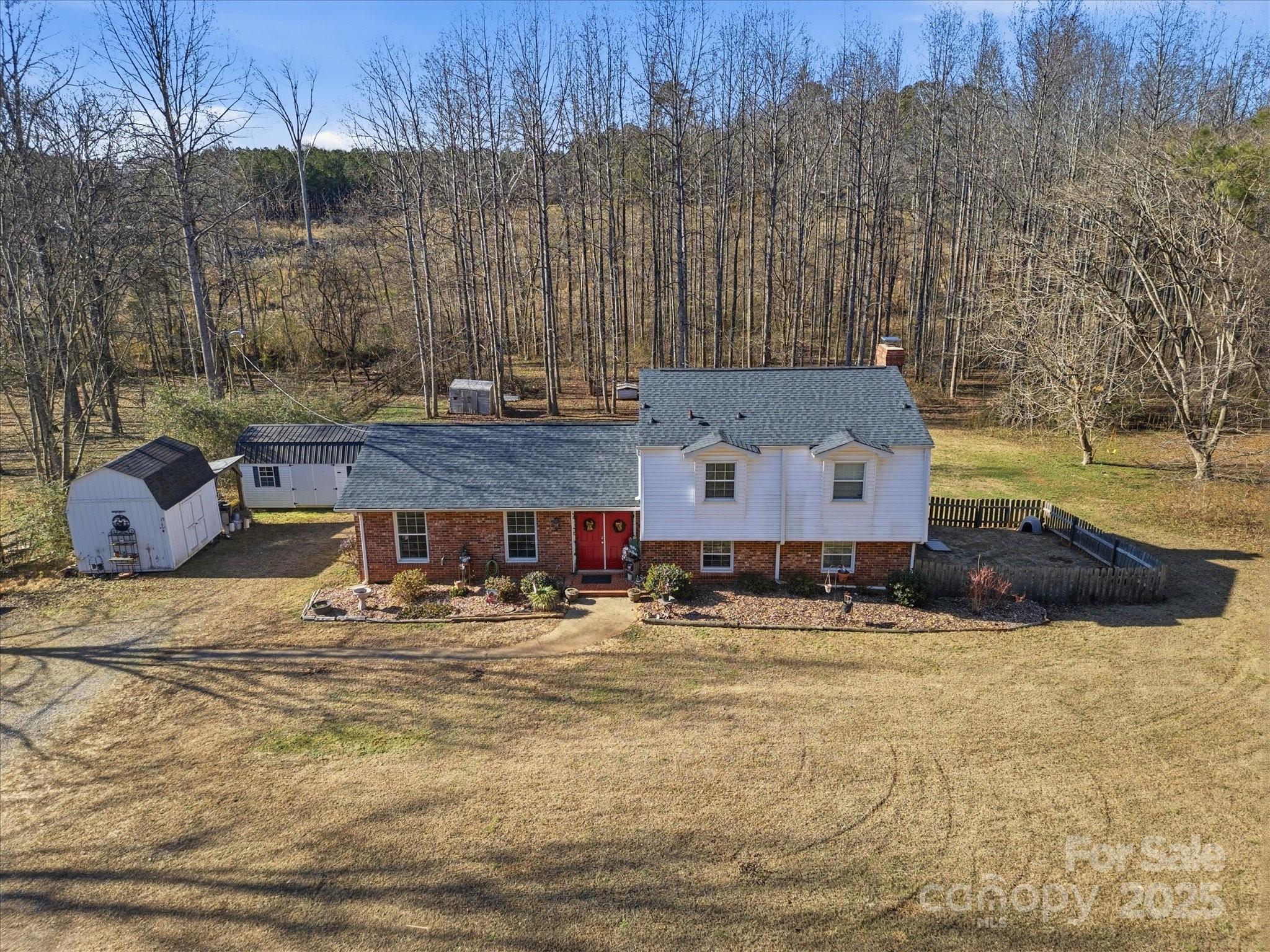 9941 Ferguson Road Charlotte, NC 28227 - Photo 4 of 29 a room with pool table and chairs