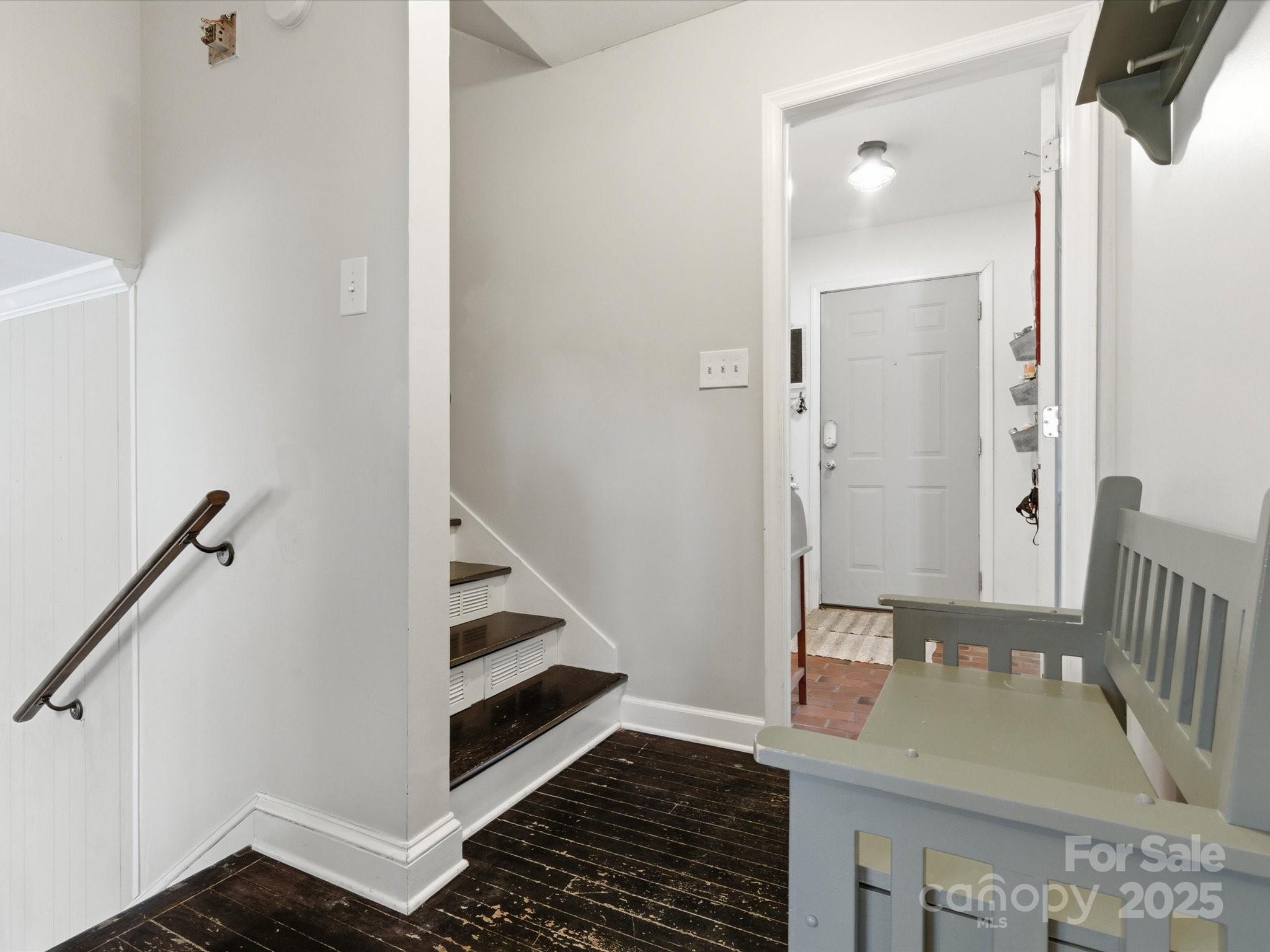 9941 Ferguson Road Charlotte, NC 28227 - Photo 10 of 29 a view of a hallway with staircase