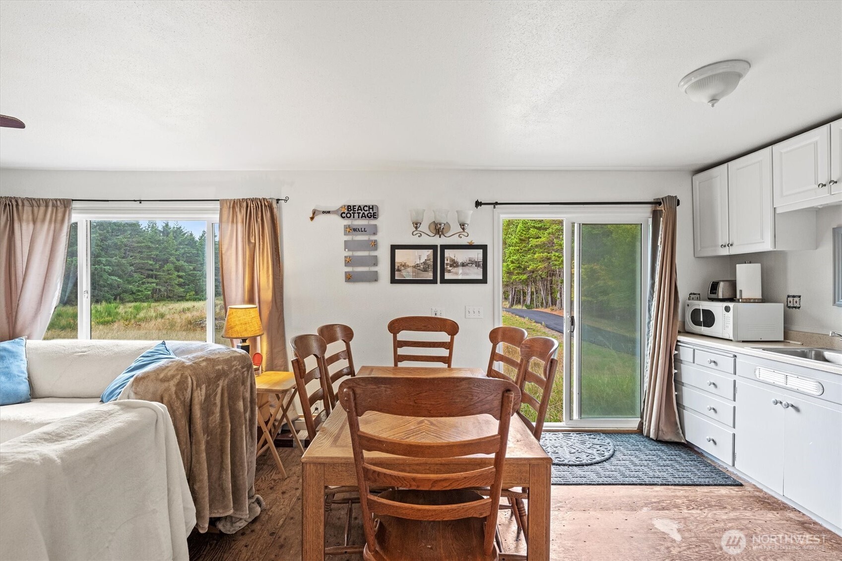 11303 Pacific Way Long Beach, WA 98631 - Photo 11 of 40 a view of a livingroom with furniture and a large window