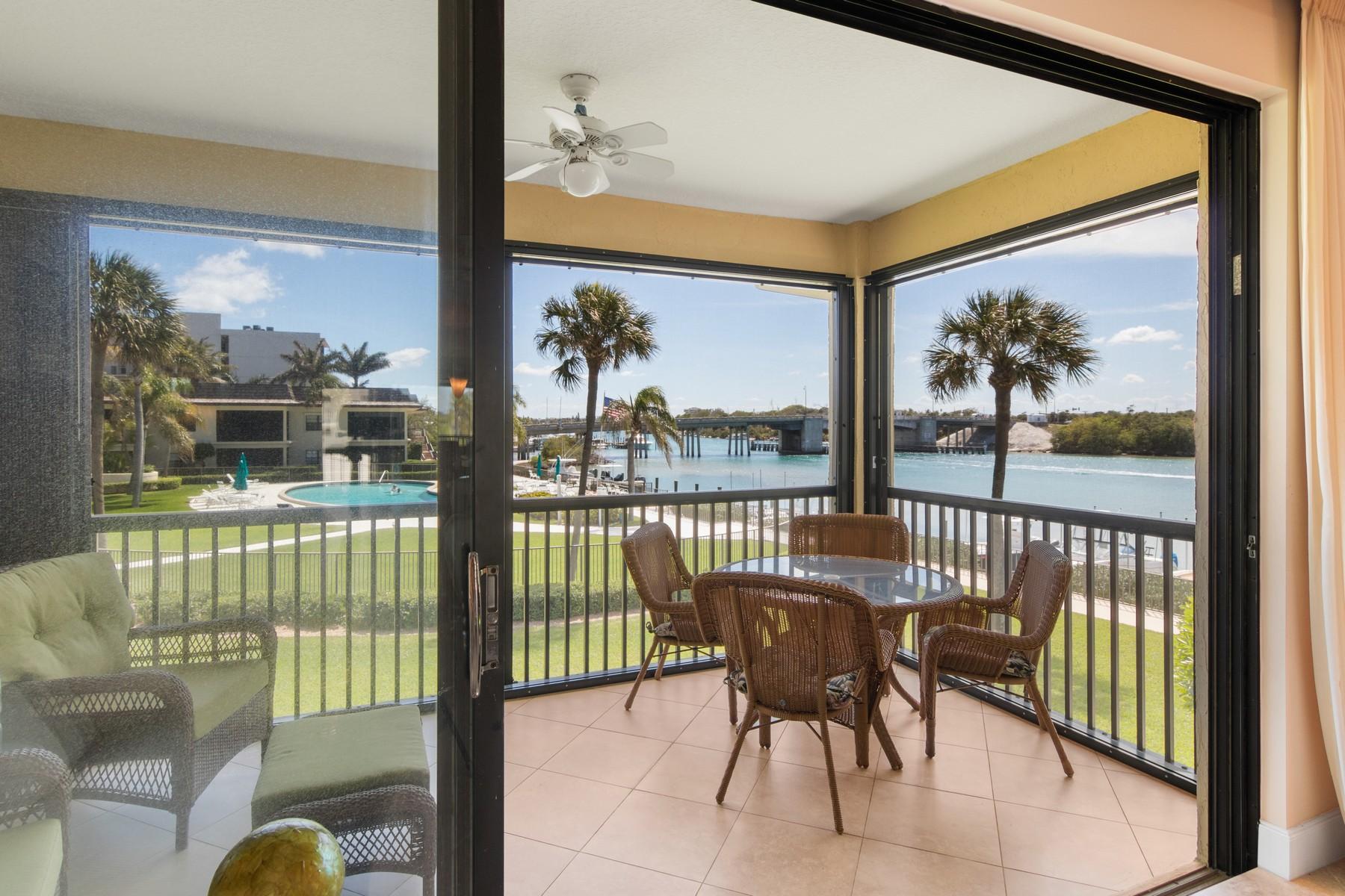 275 South Beach Road, Unit C203 Jupiter, FL 33469 - Photo 17 of 21 a view of a porch with furniture