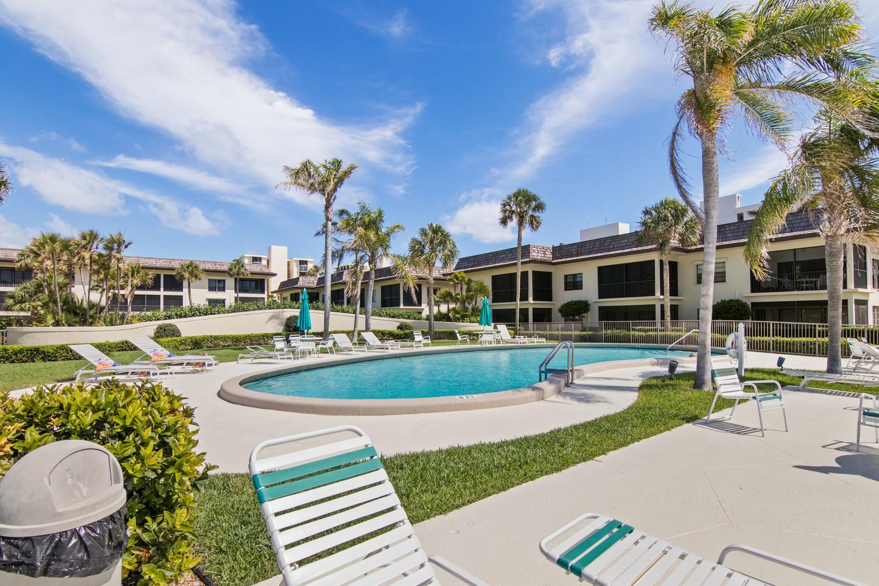 275 South Beach Road, Unit C203 Jupiter, FL 33469 - Photo 19 of 21 a view of a house with a swimming pool