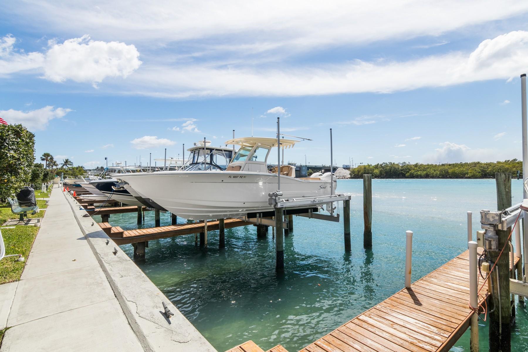 275 South Beach Road, Unit C203 Jupiter, FL 33469 - Photo 21 of 21 a terrace with outdoor seating and city view