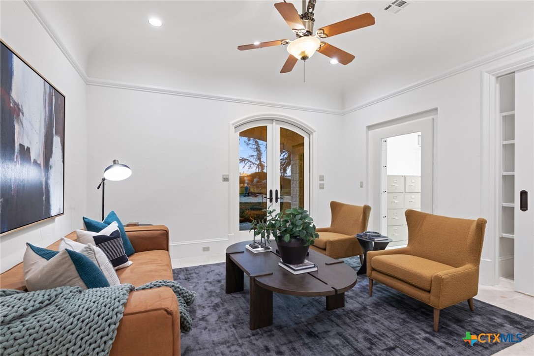 8536 Armstrong Road Belton, TX 76513 - Photo 21 of 41 a living room with furniture and a large window