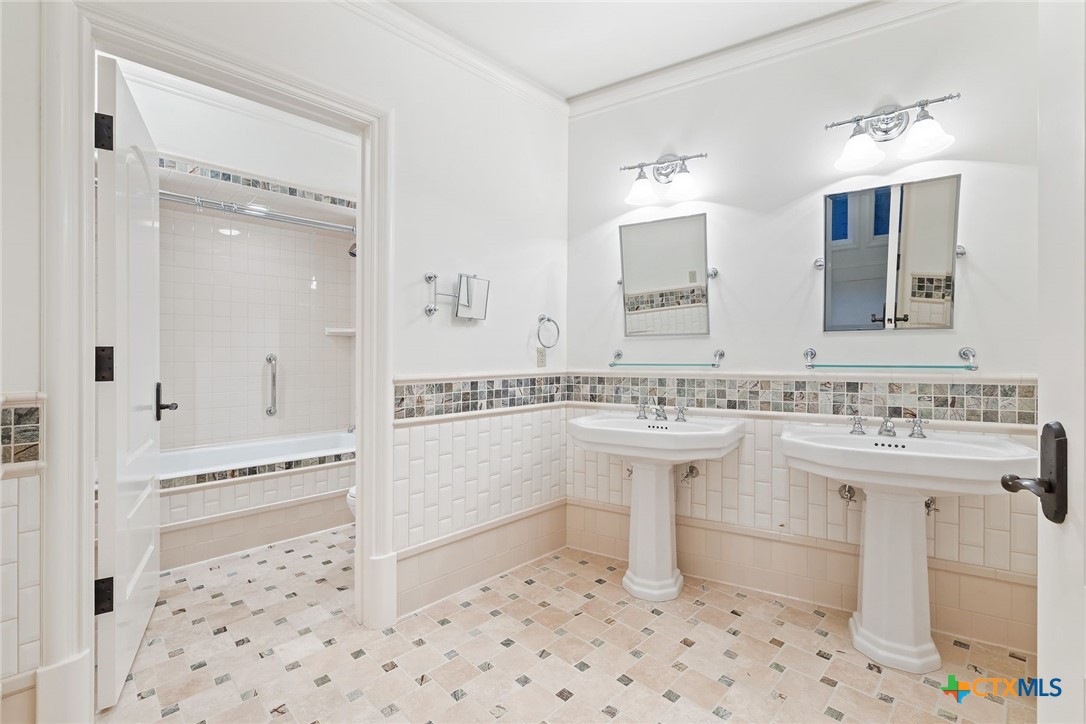 8536 Armstrong Road Belton, TX 76513 - Photo 27 of 41 a bathroom with a sink a toilet and shower