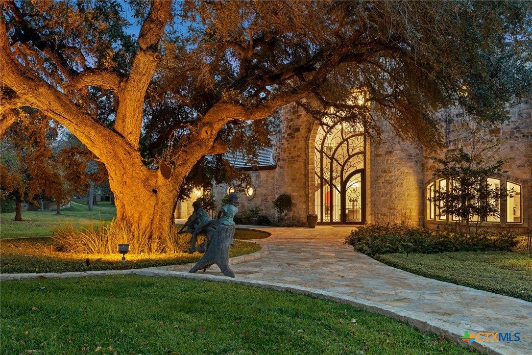 8536 Armstrong Road Belton, TX 76513 - Photo 31 of 41 a front view of a house with garden and trees
