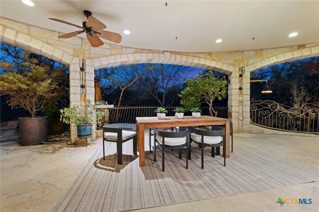 8536 Armstrong Road Belton, TX 76513 - Photo 32 of 41 a view of a patio with table and chairs with wooden floor and potted plants